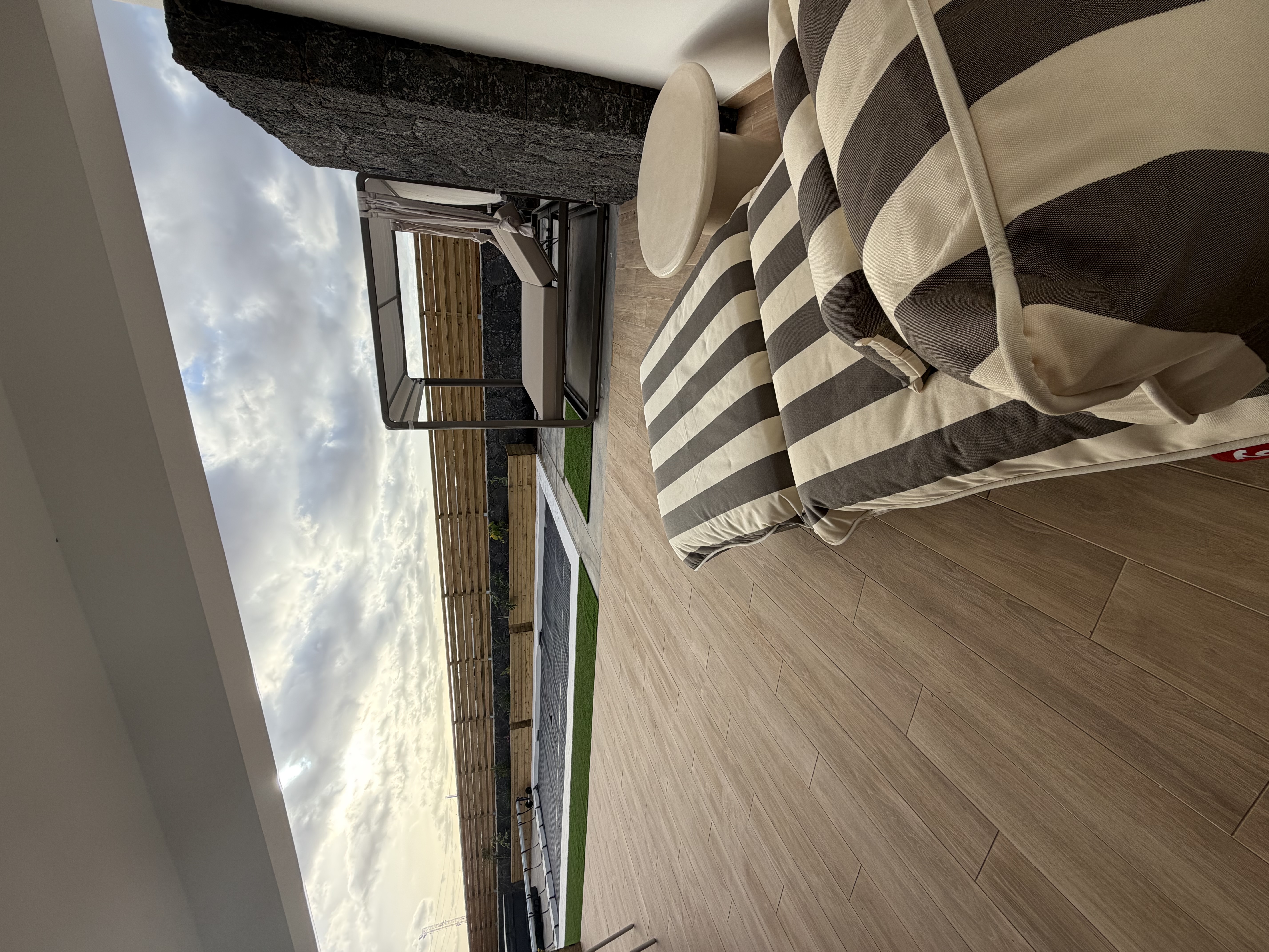 Cozy nook with cushions and throw