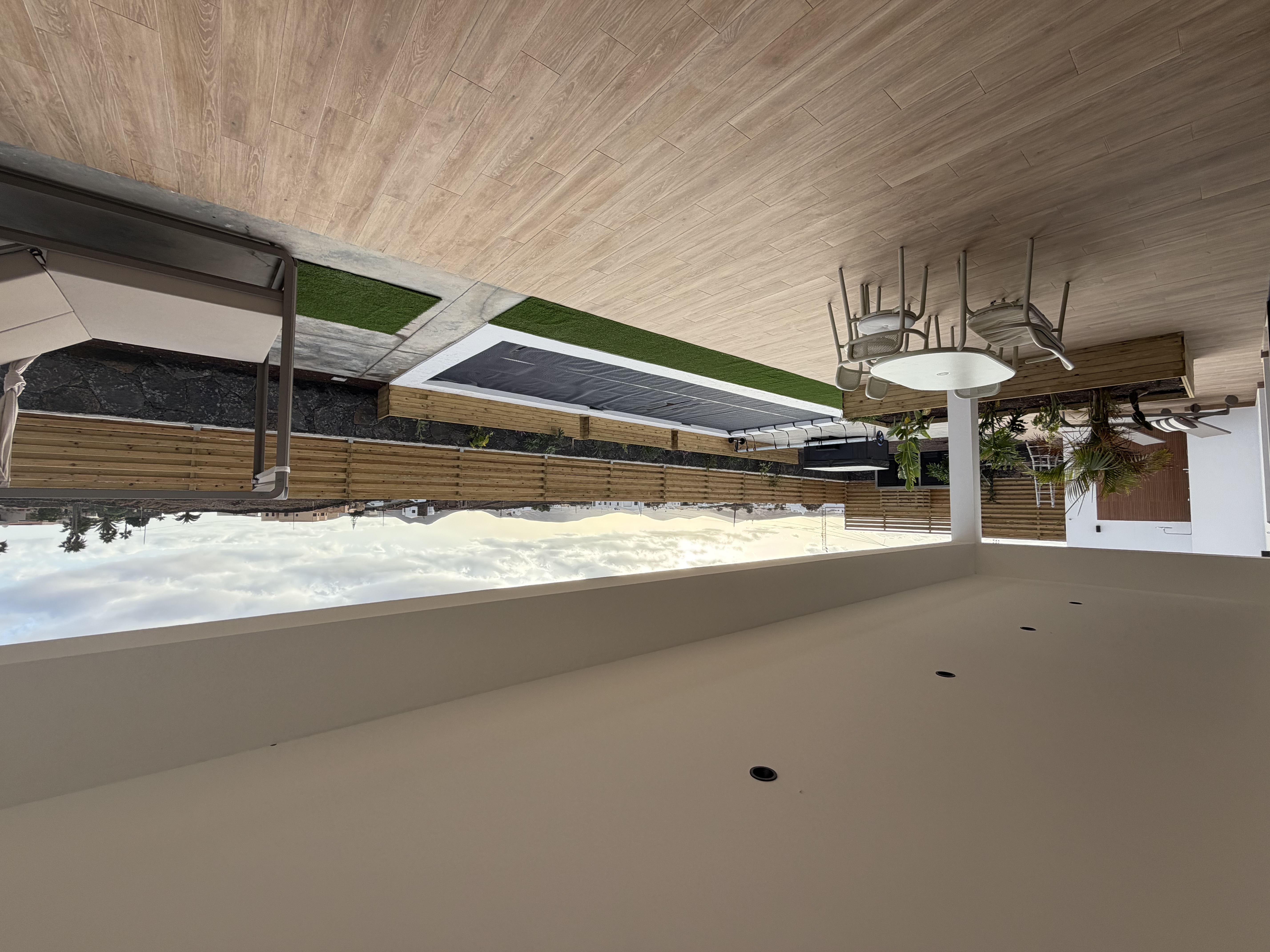 Outdoor lounge with pergola or shade