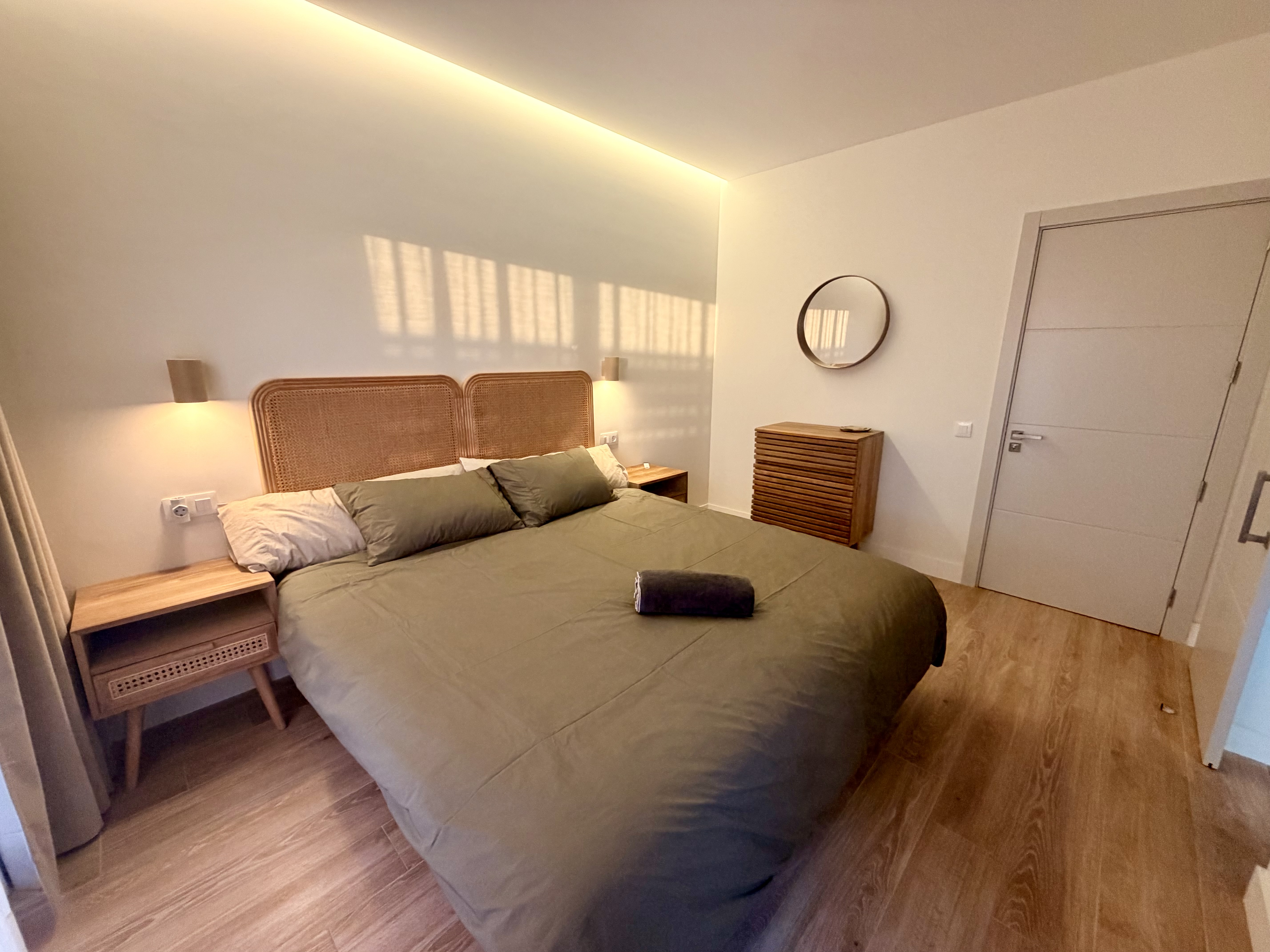 Bedroom detail with soft textiles at Elements Lajares