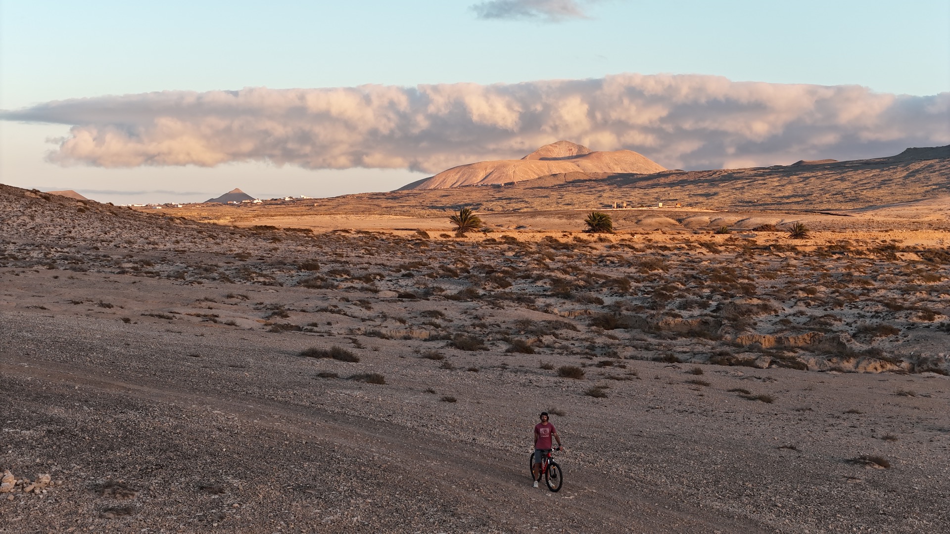 Guest riding a bike on trails near Lajares