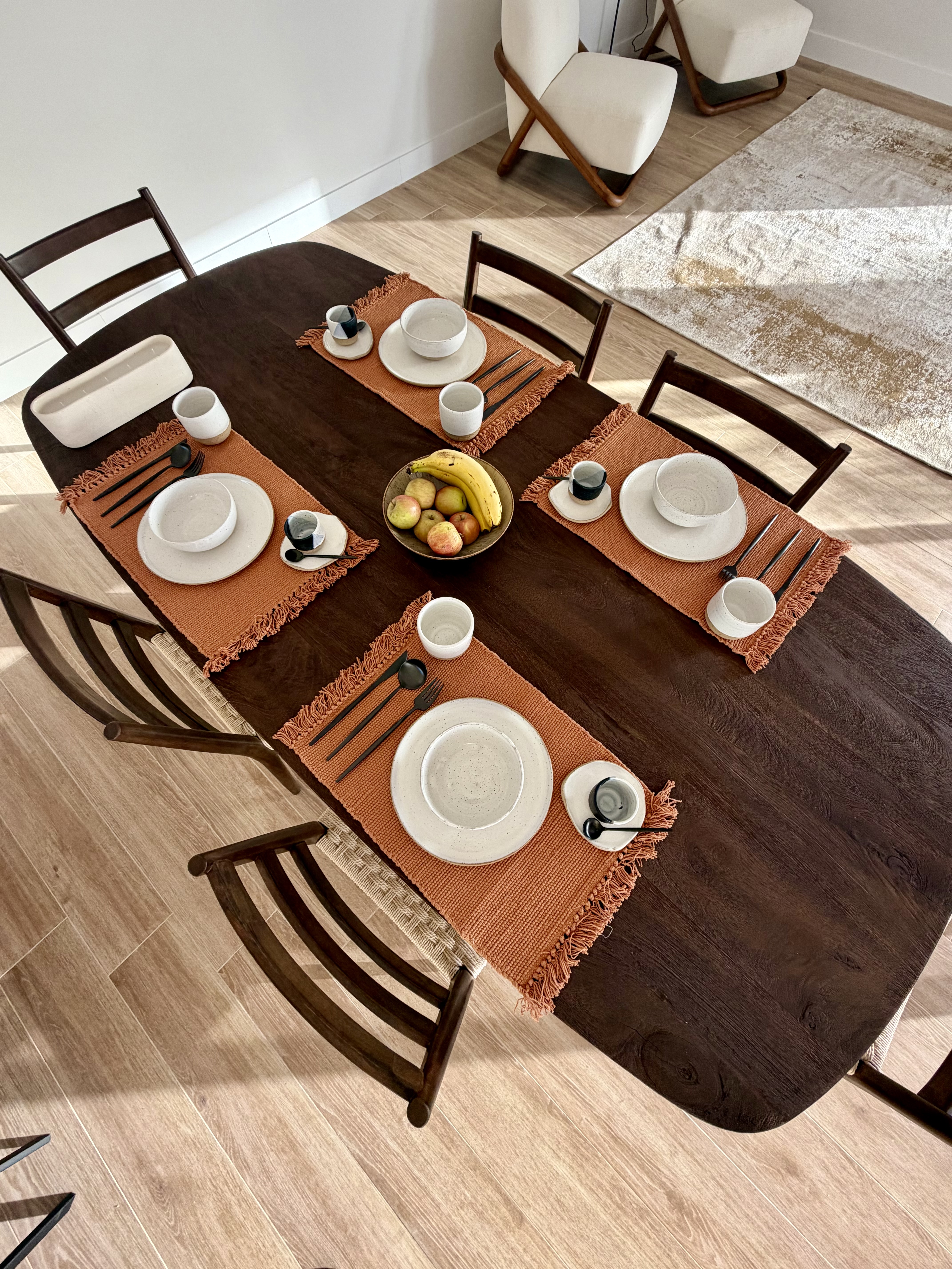 Dinner setup at Elements Lajares with shared plates and wine