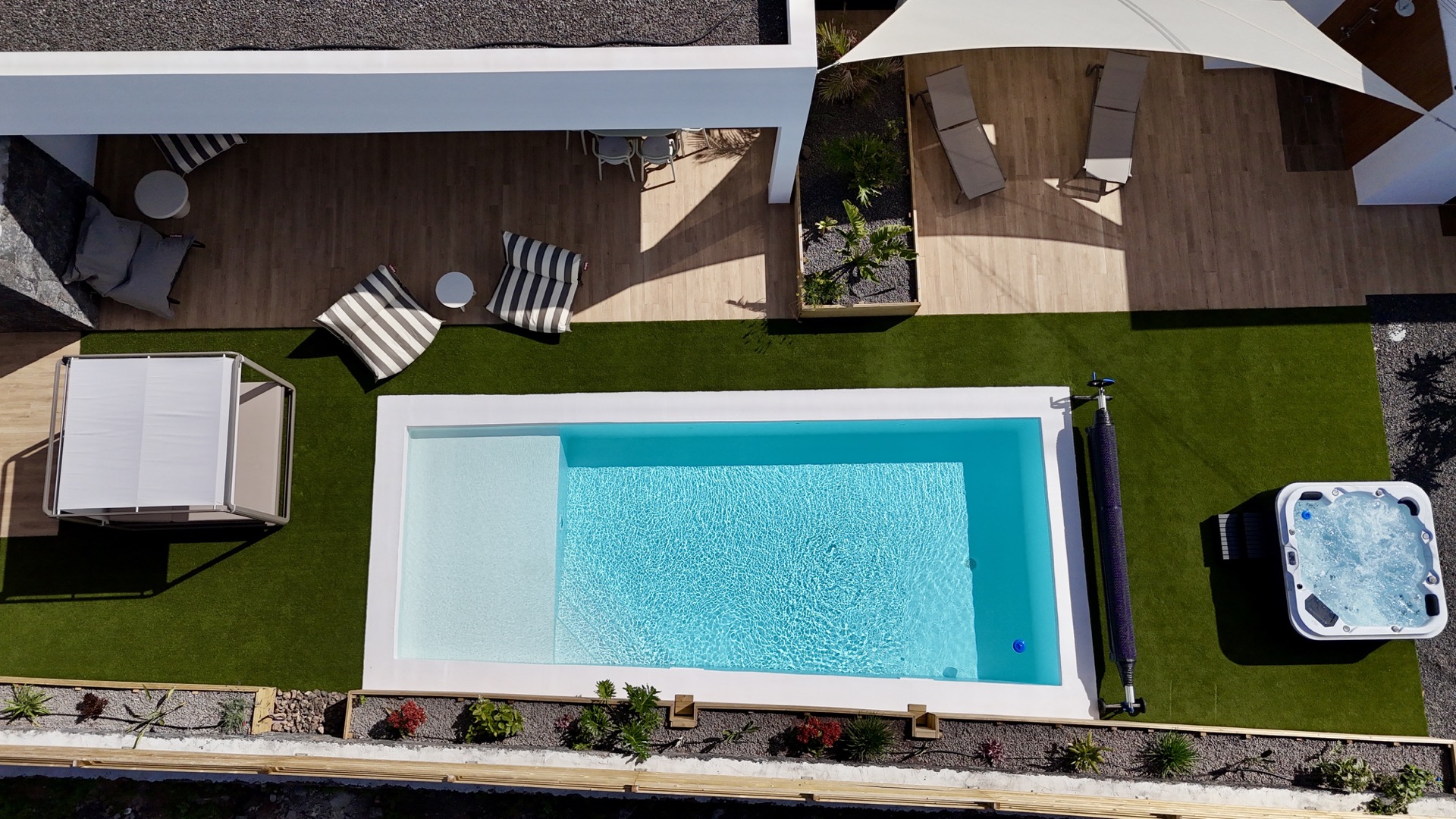Aerial view of outdoor area with heated swimming pool and jacuzzi at Elements Lajares
