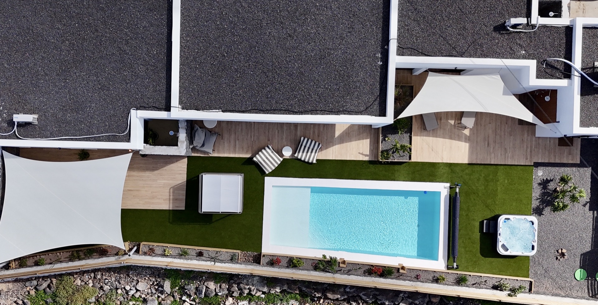 Aerial view of outdoor garden with pool and jacuzzi at Elements Lajares