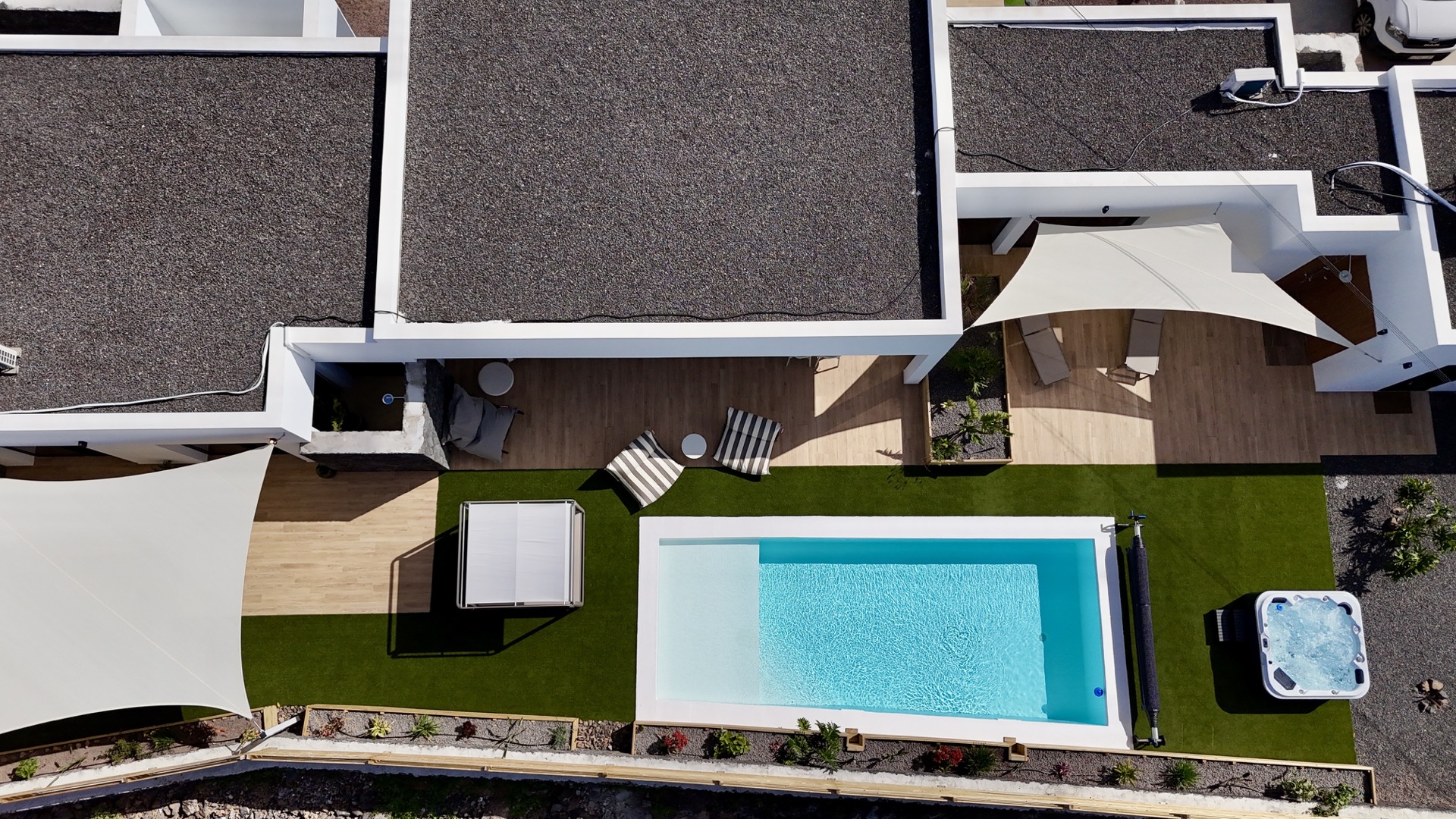 Aerial view of the outdoor area with swimming pool and jacuzzi at Elements Lajares