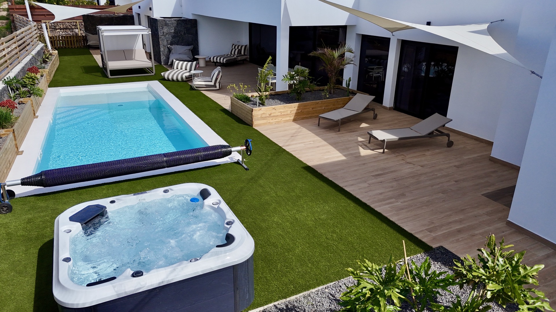 Aerial view of outdoor garden with pool and jacuzzi at Elements Lajares