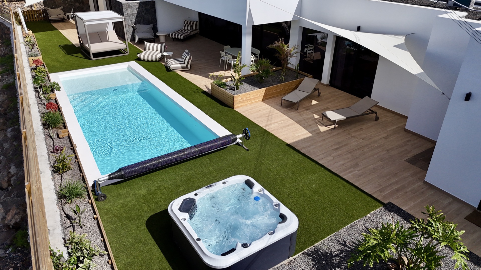 Aerial view of pool, jacuzzi and outdoor garden at Elements Lajares