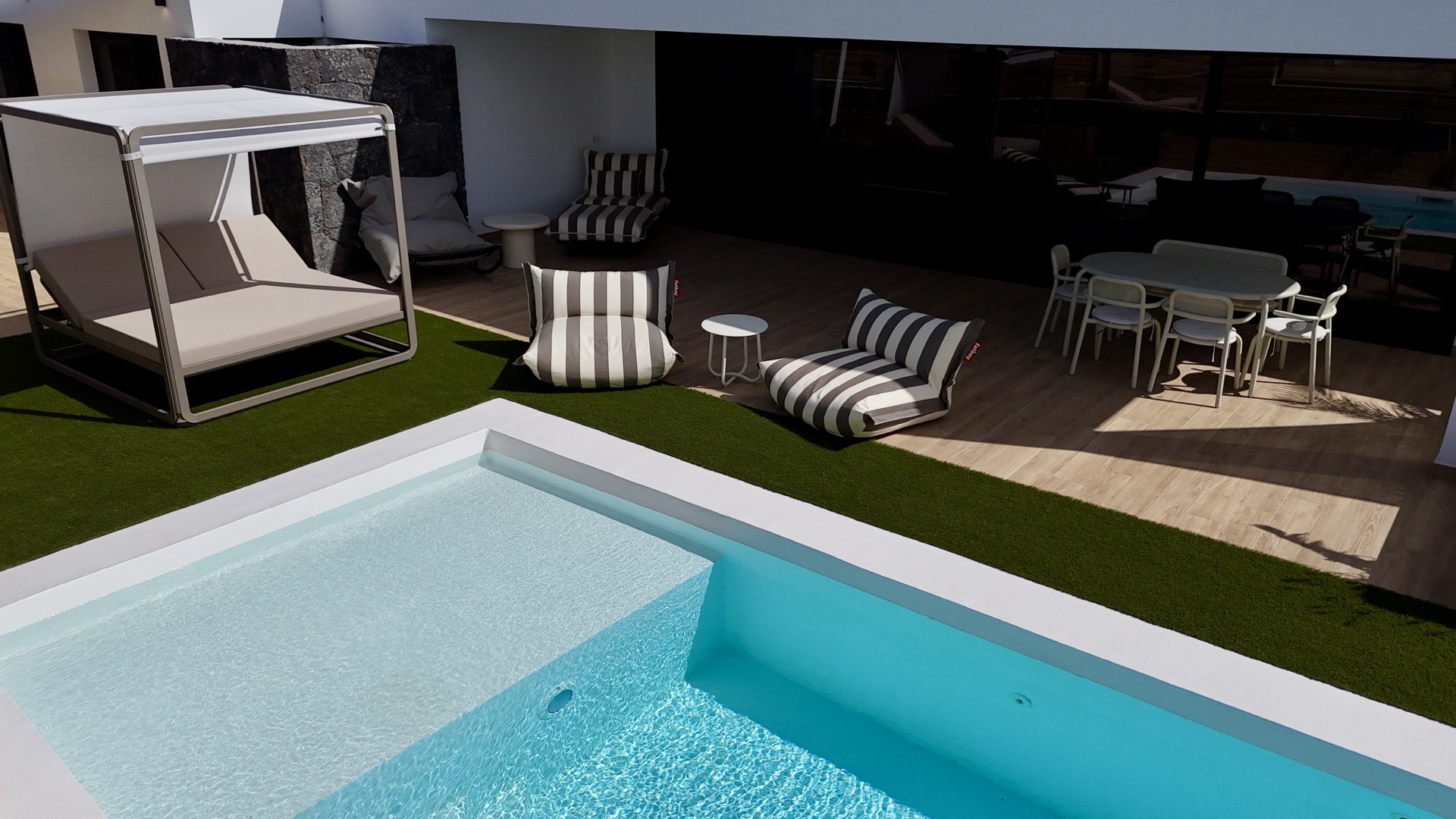 Aerial shot of outdoor area with swimming pool and jacuzzi at Elements Lajares